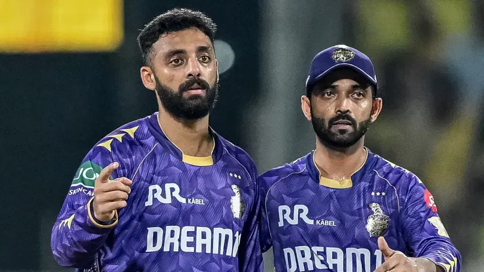 Varun Chakaravarthy and Ajinkya Rahane [Source: AFP]